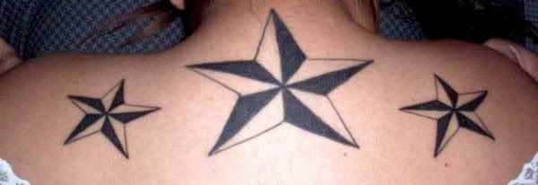 3 nautical stars across my upper back, a scorpion on my left hip and this 