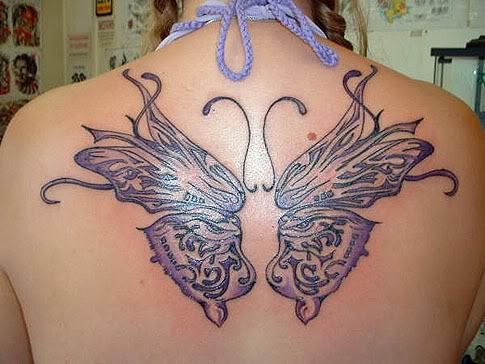 butterfly tattoo pictures. Upperback utterfly tattoo.
