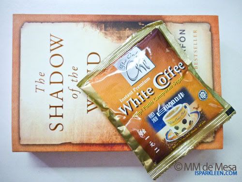 Book and coffee The Shadow of the Wind and White Coffee