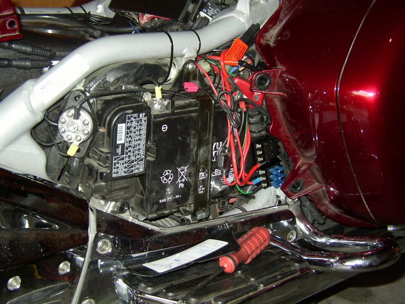 where to install auxiliary fuse block??? gl1800riders 2005 Taurus Fuse Box the fuse block in place it fits around the big wire harness i got the same one and here is a pic of mine installed with the grounding block also
