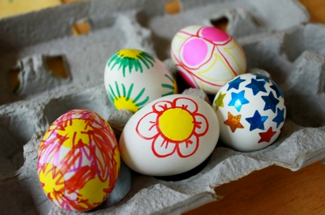 Decorating eggs with markers and stickers