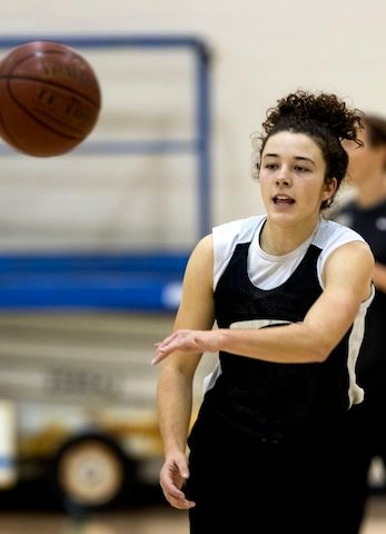 Daniella Guglielmo flicks a pass up the floor during a Mitty November practice.