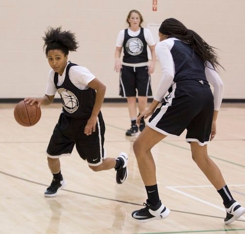 Heleyna Hill, left, pushes the ball up the floor during a Mitty November practice.