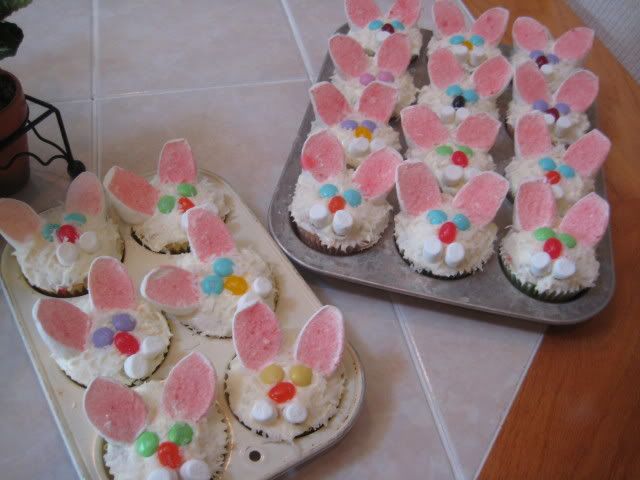 easter bunny cupcakes marshmallows. Use jelly beans for eyes and nose and two mini marshmallows for the two front teeth. Sprinkle with shredded coconut.