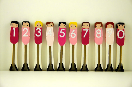 Pretty Fickle clothespin number dolls