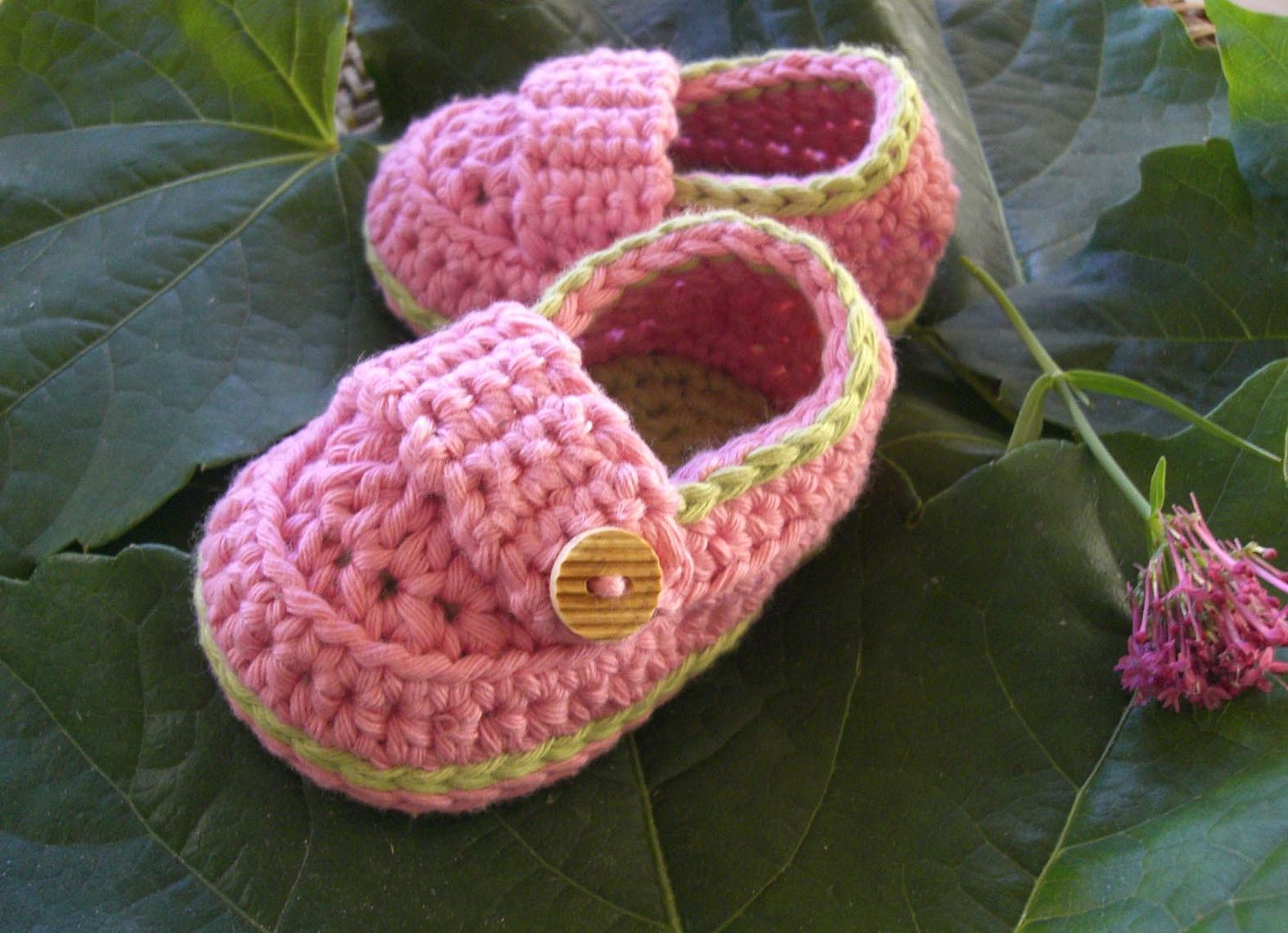 Pink crochet baby booties from Catherine Audoyer