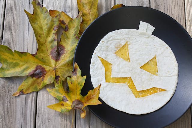 Jack-o-Lantern Quesadillas made with Halloween cookie cutters at eYe likes food