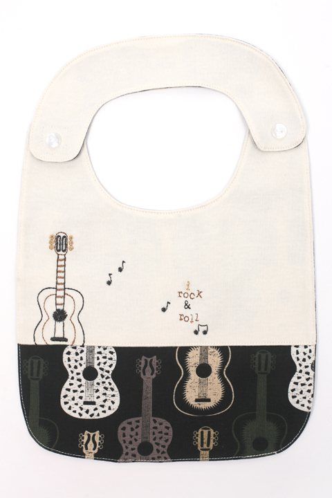 Cotton jersey baby bib with modern guitar pattern