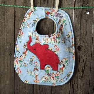 Hip Violet Baby Bib with red elephant