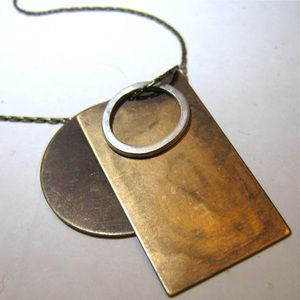 Love Necklace in brass and sterling silver